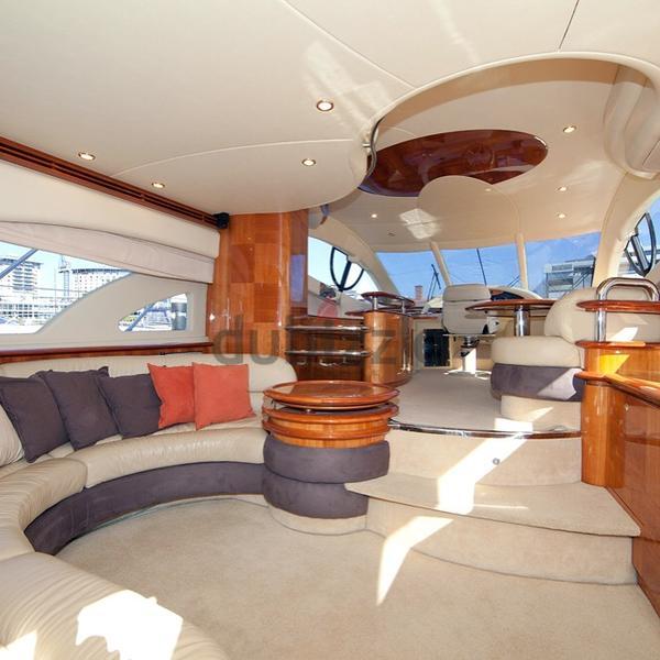 Professional photographer capturing guests on a yacht cruise in Abu Dhabi